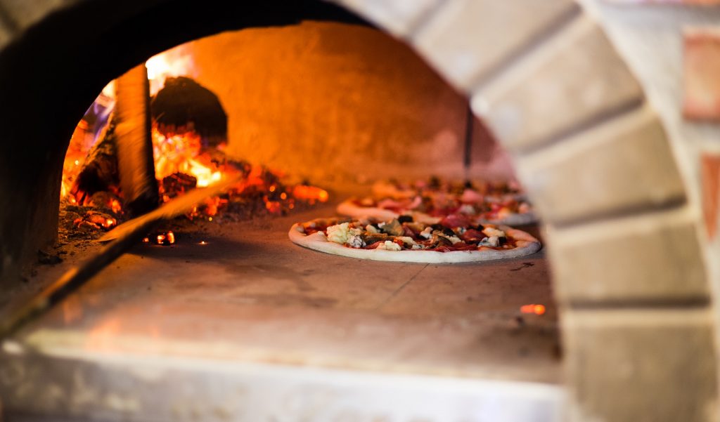 Neapolitan pizza in wood-fired oven