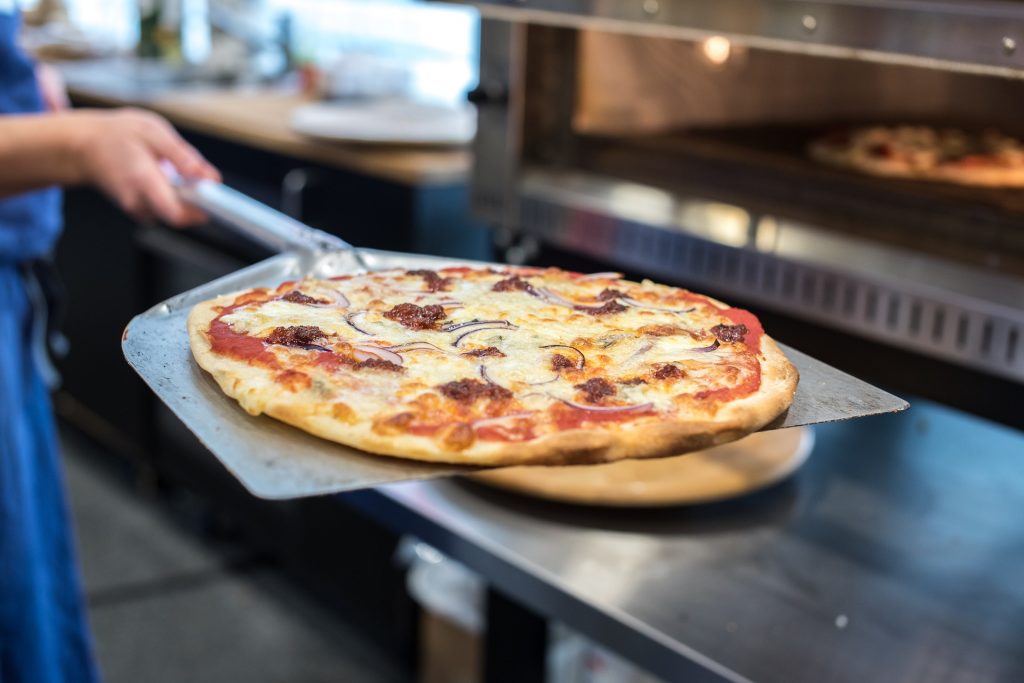 The Difference Between A Pizza Peel & Pizza Paddle