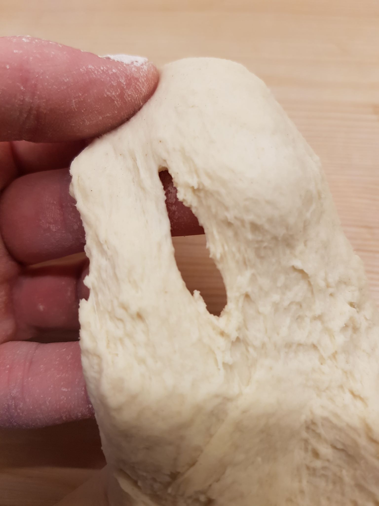 How to Fix Pizza Dough Tearing: Expert Solutions