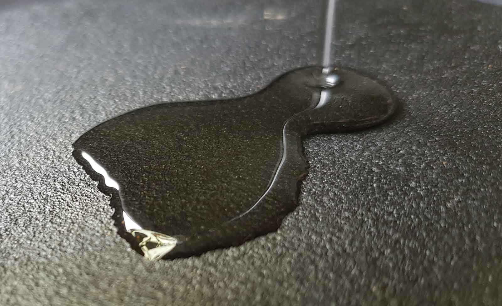 oil flowing on a metallic surface