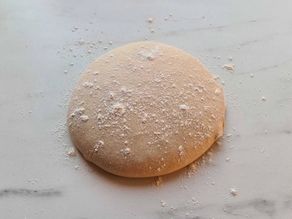 Dusted pizza dough