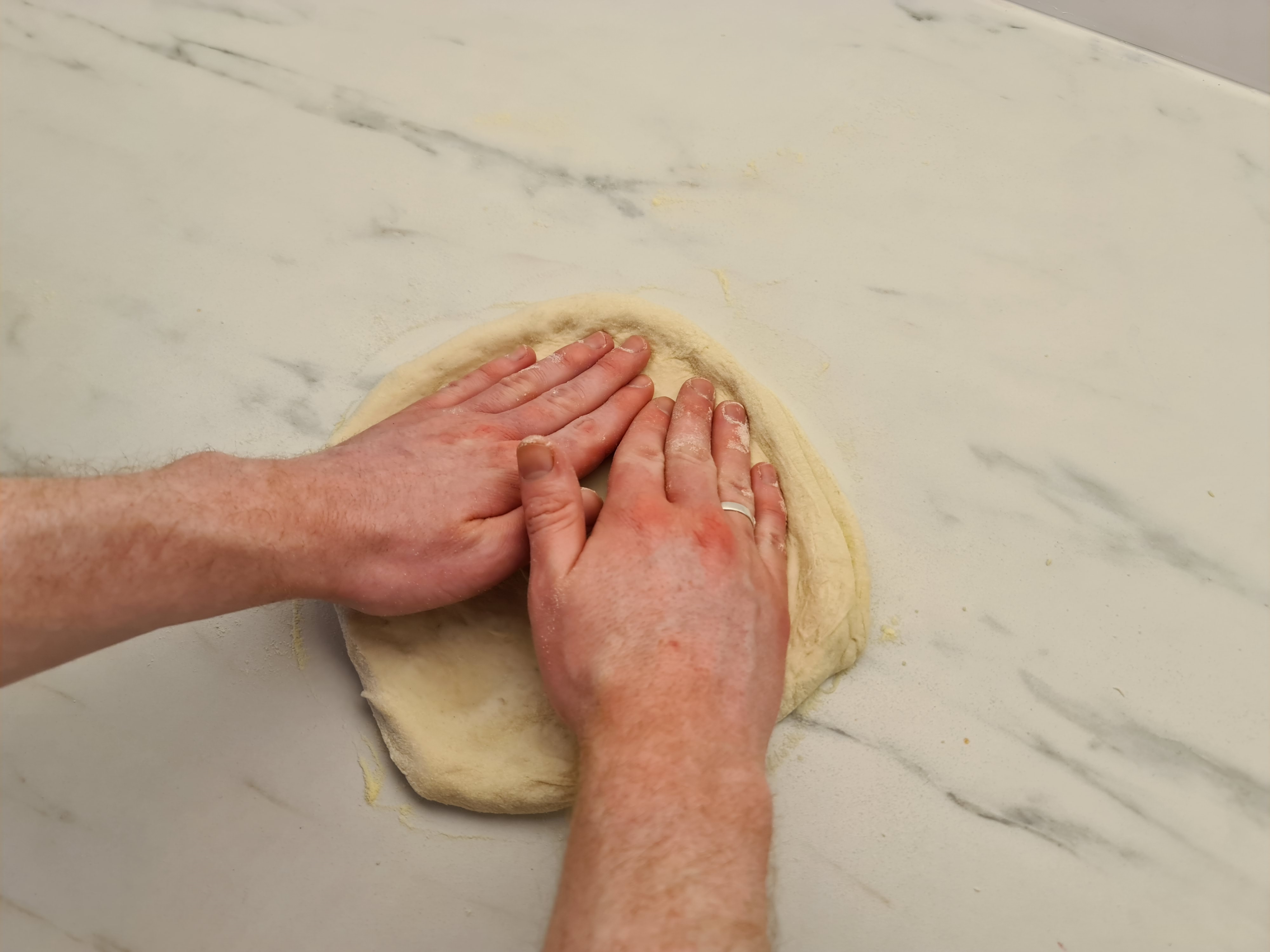 Stretching pizza dough